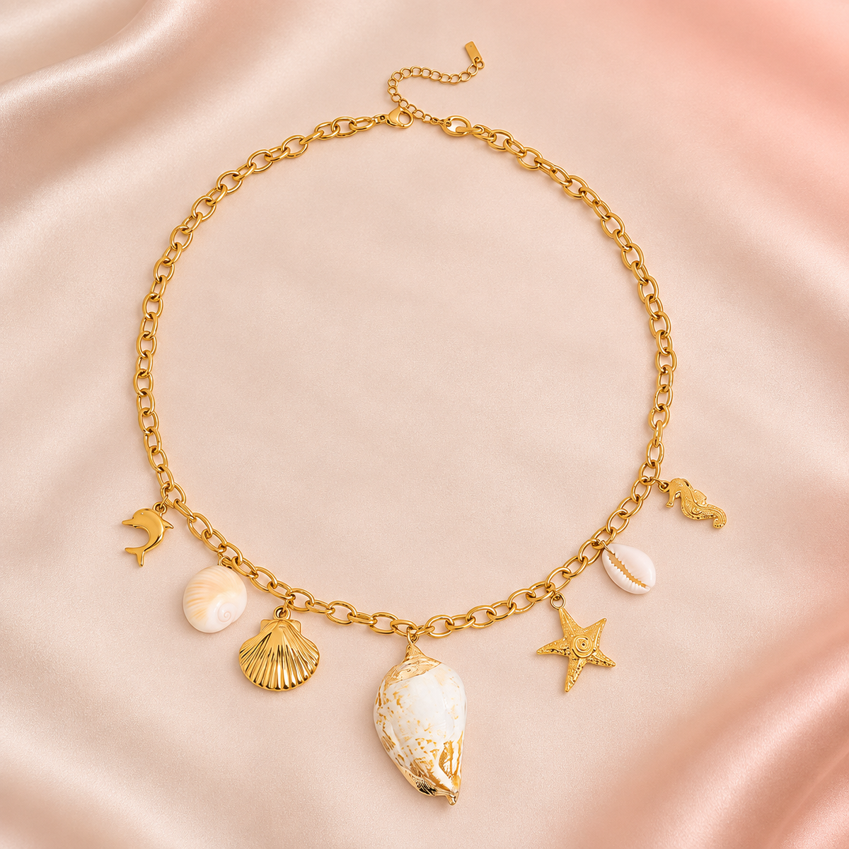 Gold-tone necklace with seven marine-themed charms