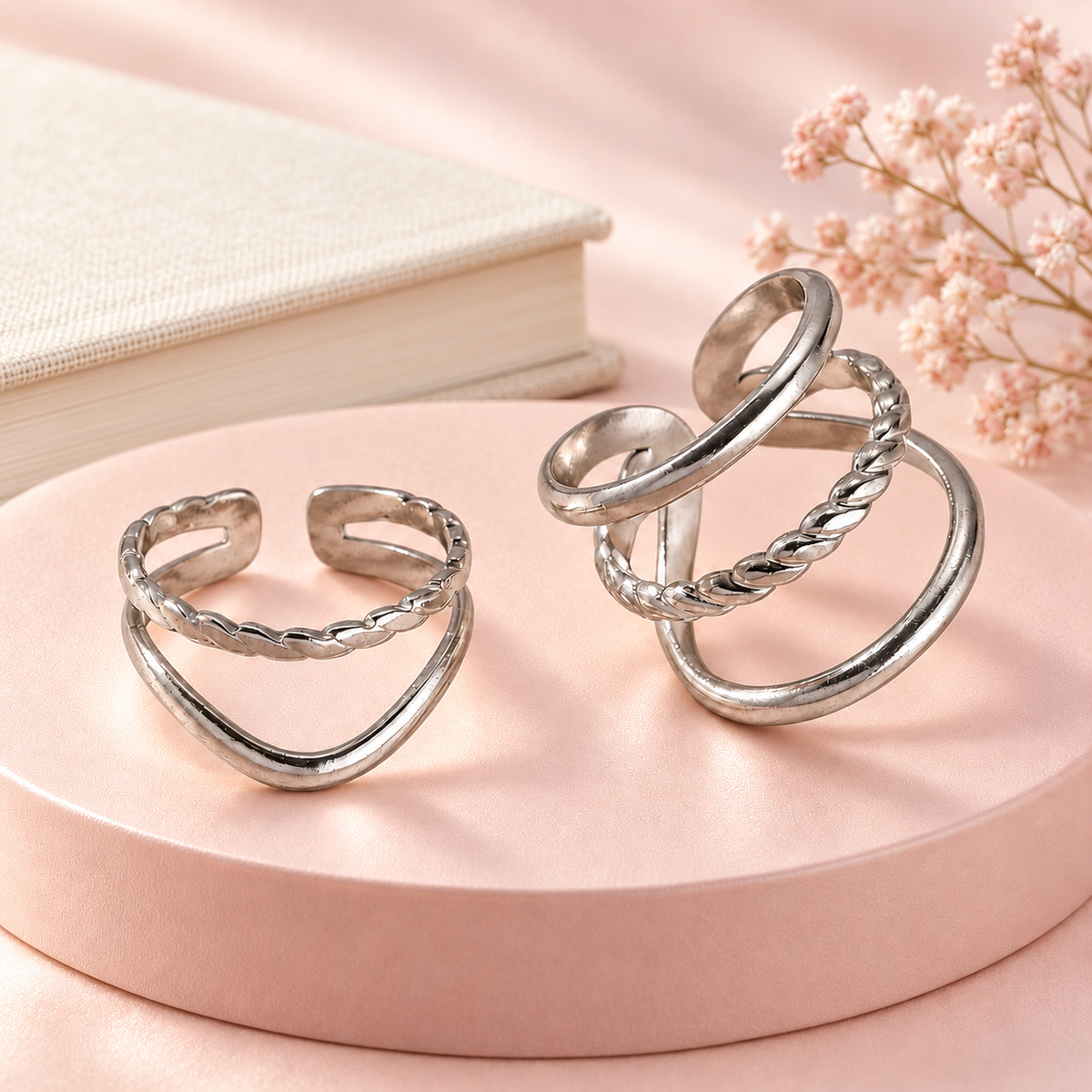 Silver-Tone Layered Ring Designs in a styled product photograph