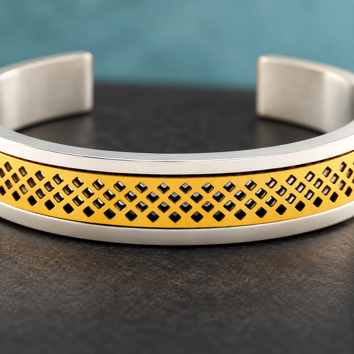 Close-up of the two-tone cuff's diamond-pattern centre and silver-tone rims