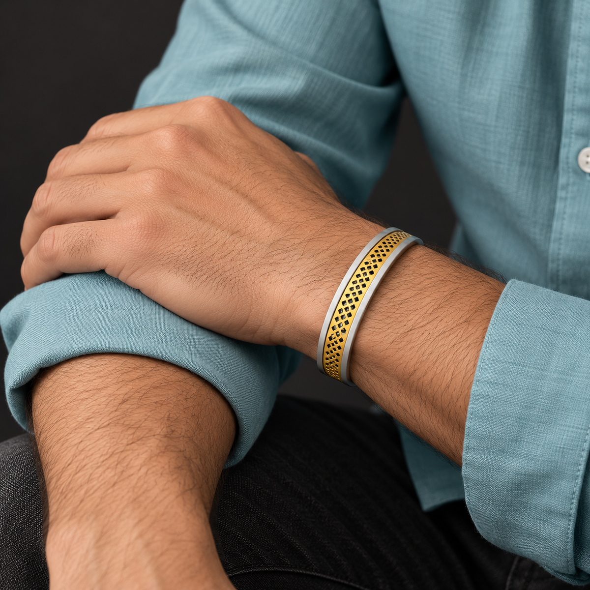 Two-tone lattice cuff worn with an aqua shirt