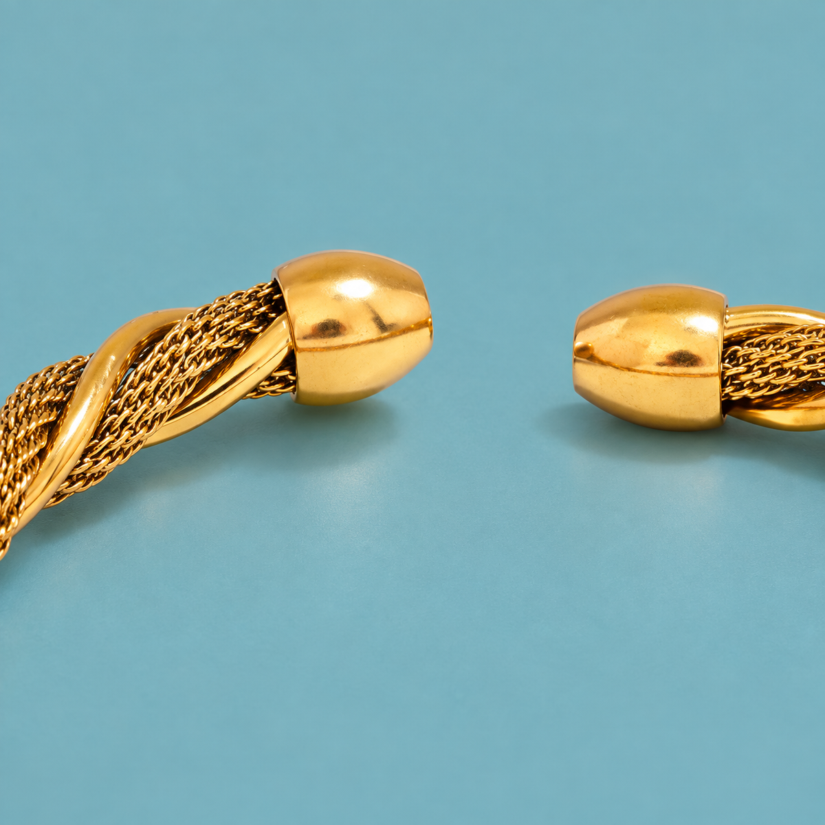 Close-up of the twisted mesh cuff's rounded open ends