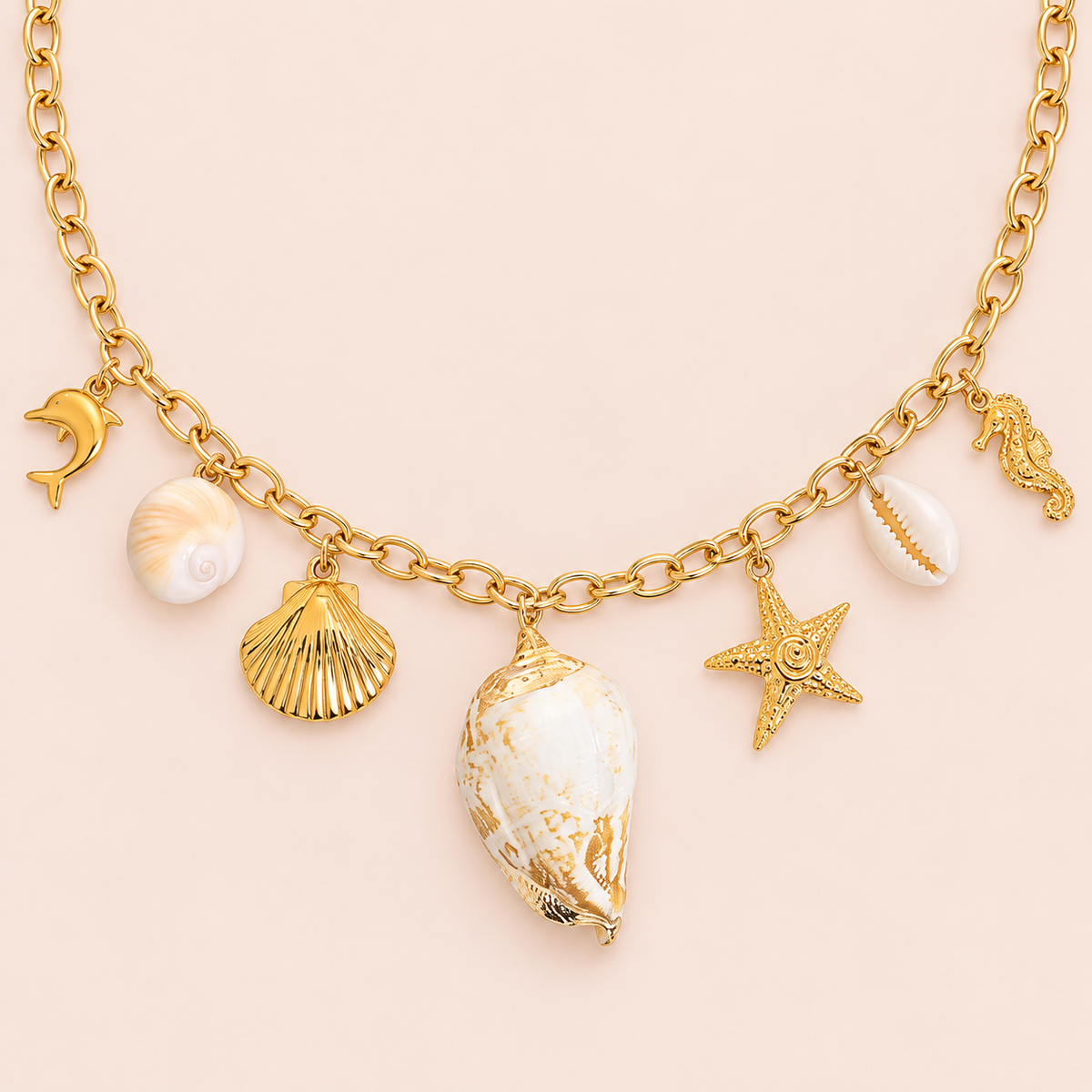 Gold-tone necklace with seven marine-themed charms