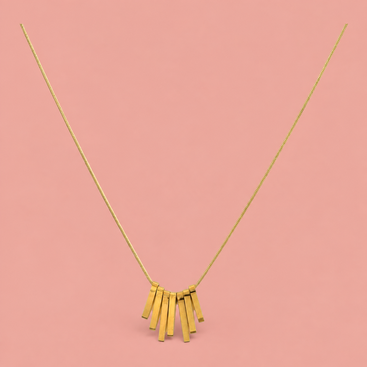 Gold-tone fine-chain necklace with seven graduated rectangular drops