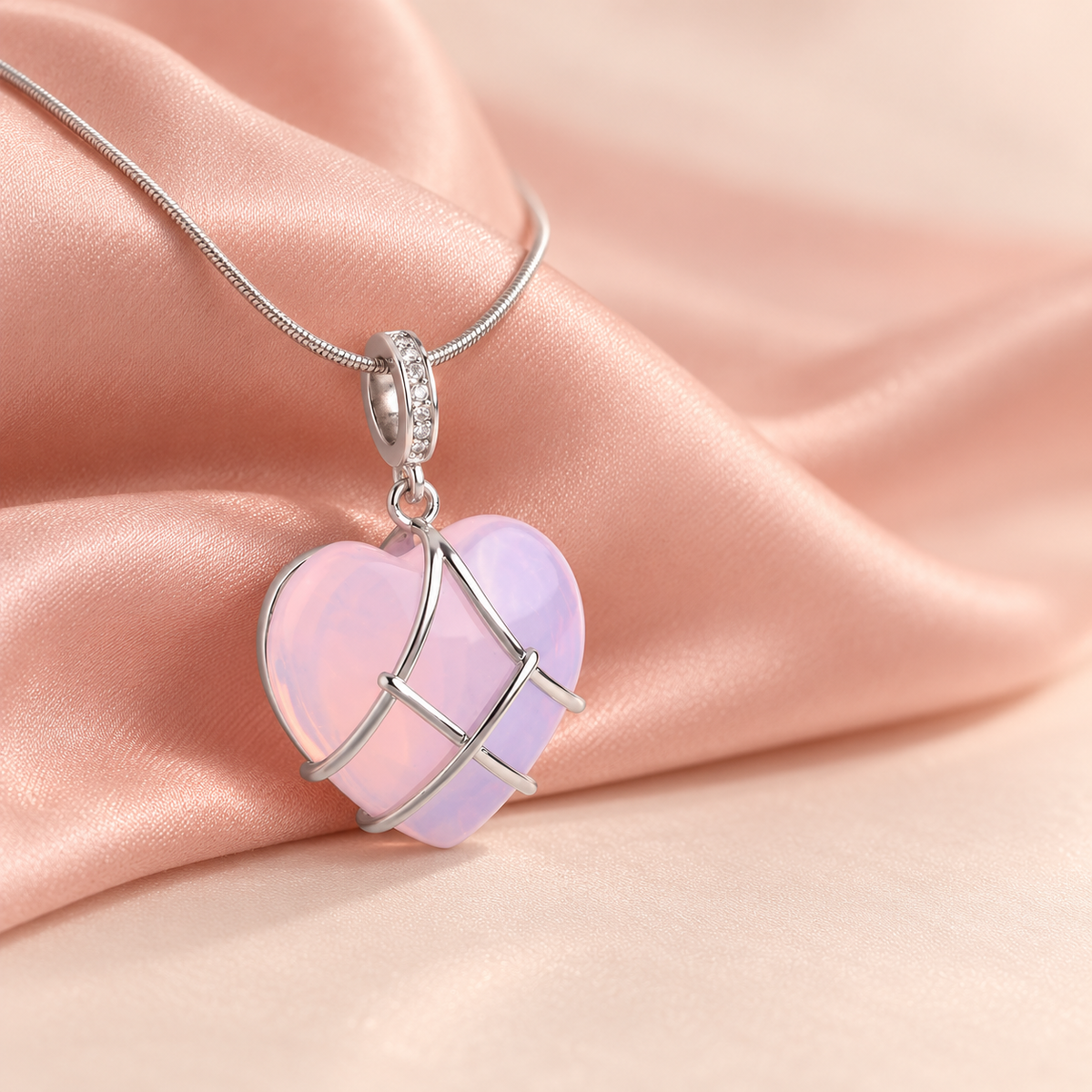 Pink-lilac heart pendant necklace with crossing silver-tone bands