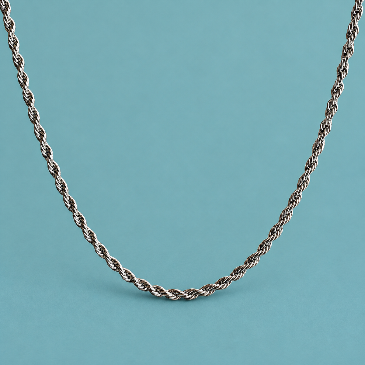 Silver-tone necklace with a twisted rope-chain pattern