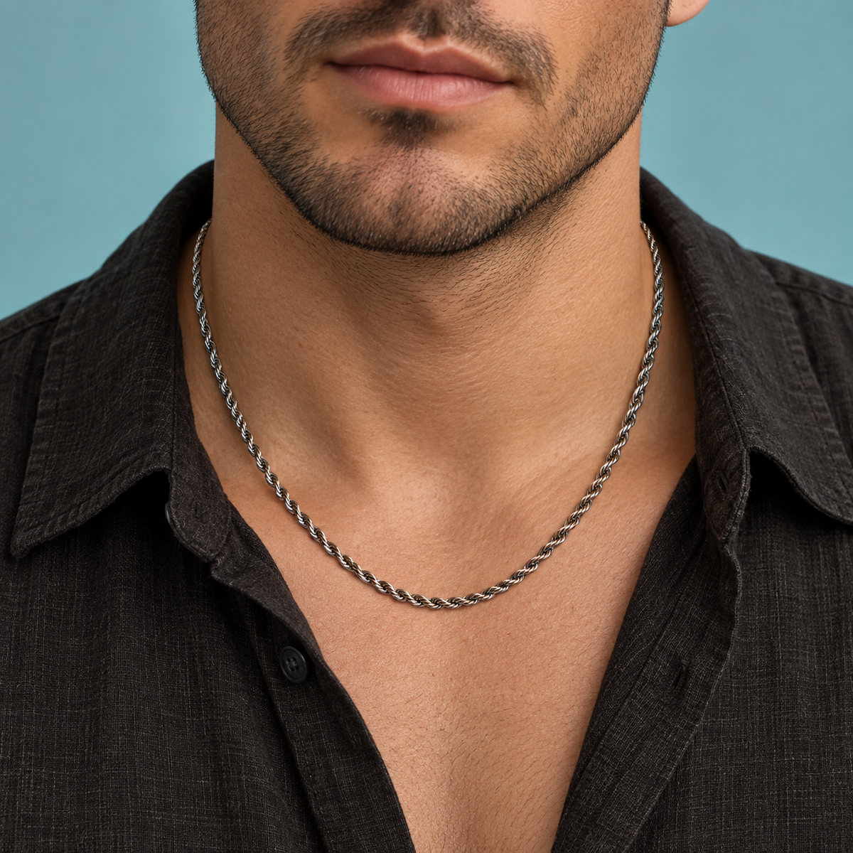 Silver-tone necklace with a twisted rope-chain pattern