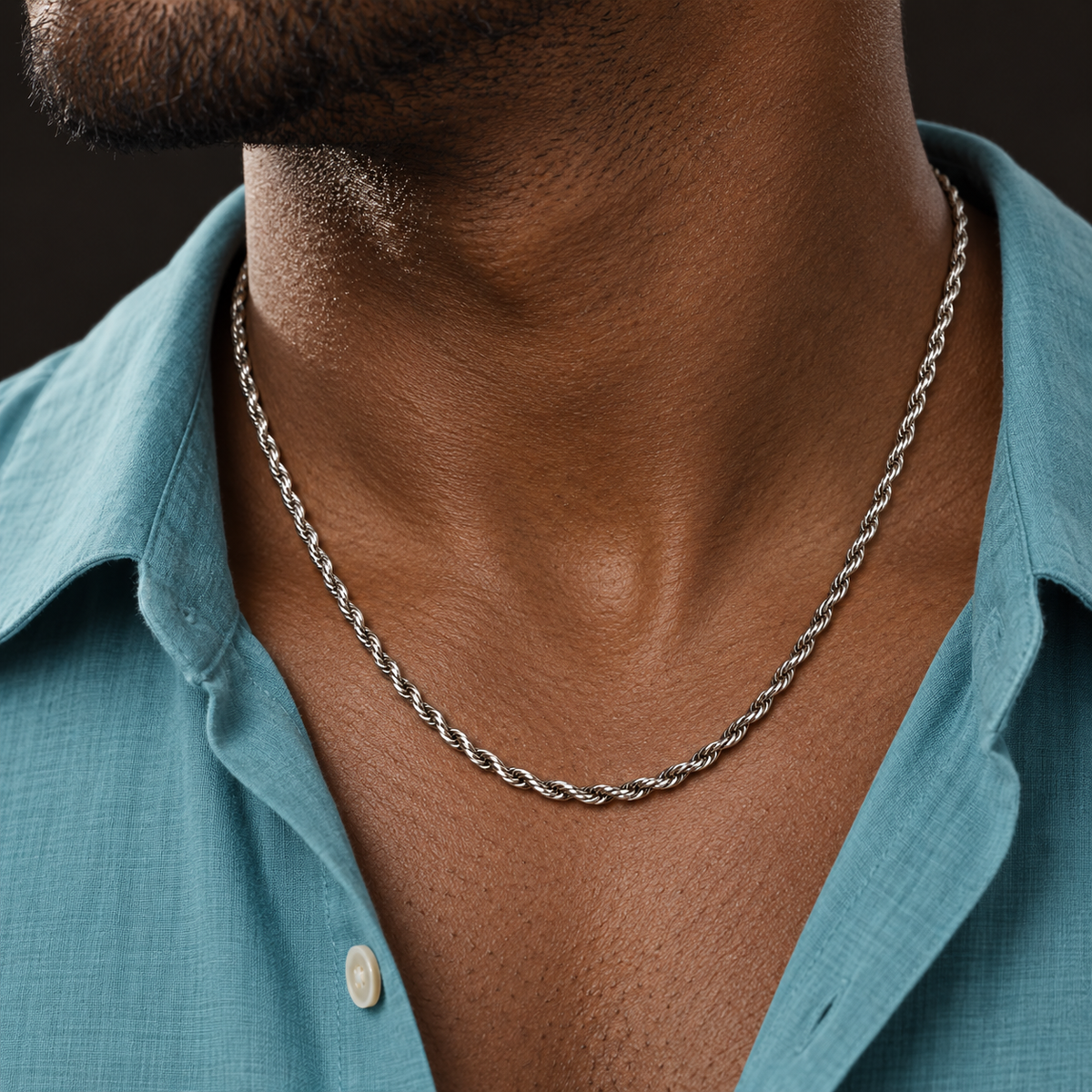 Silver-tone necklace with a twisted rope-chain pattern