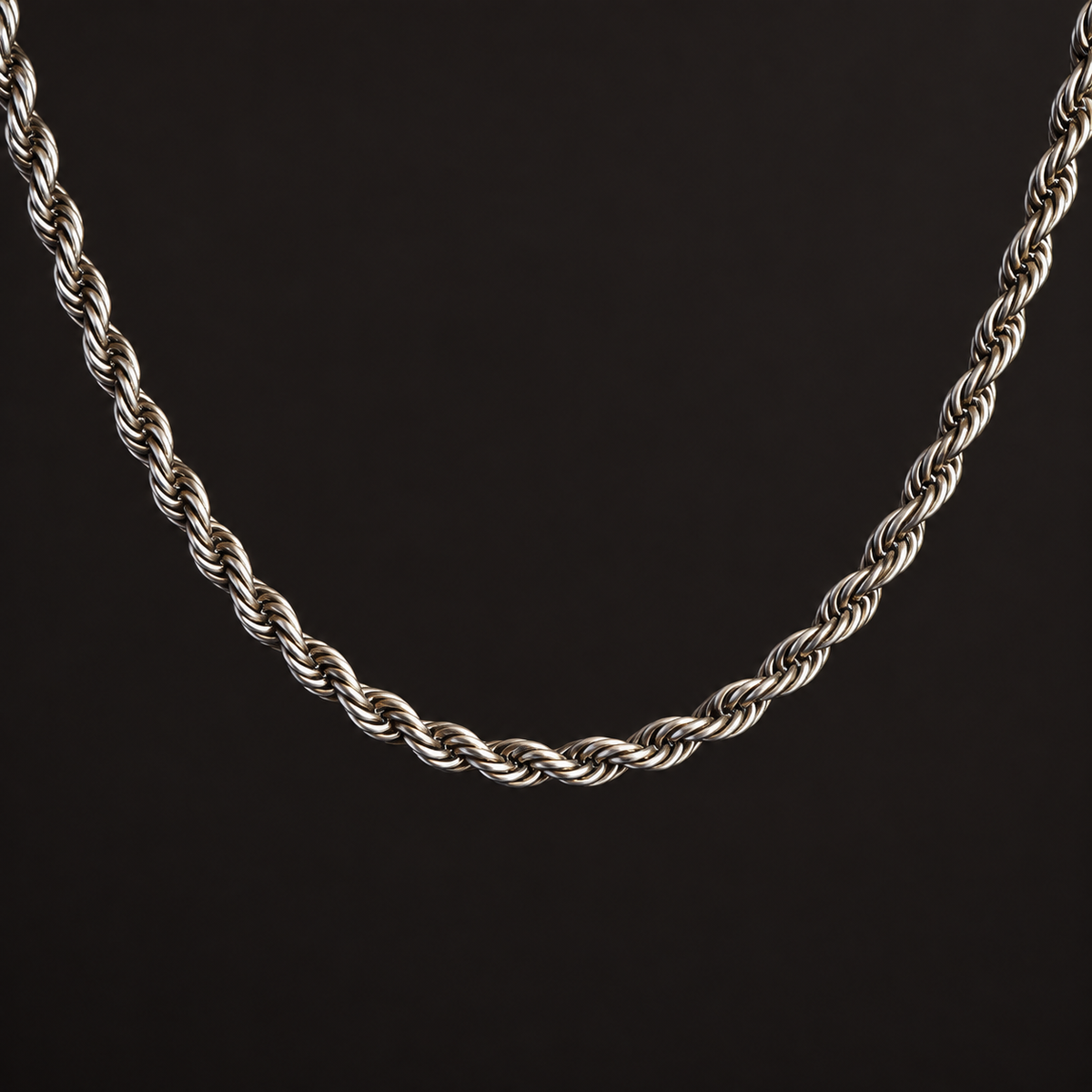 Silver-tone necklace with a twisted rope-chain pattern
