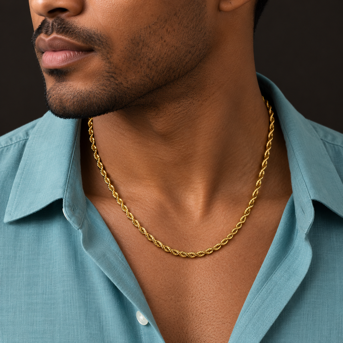Rope-style necklace shown with an open aqua shirt