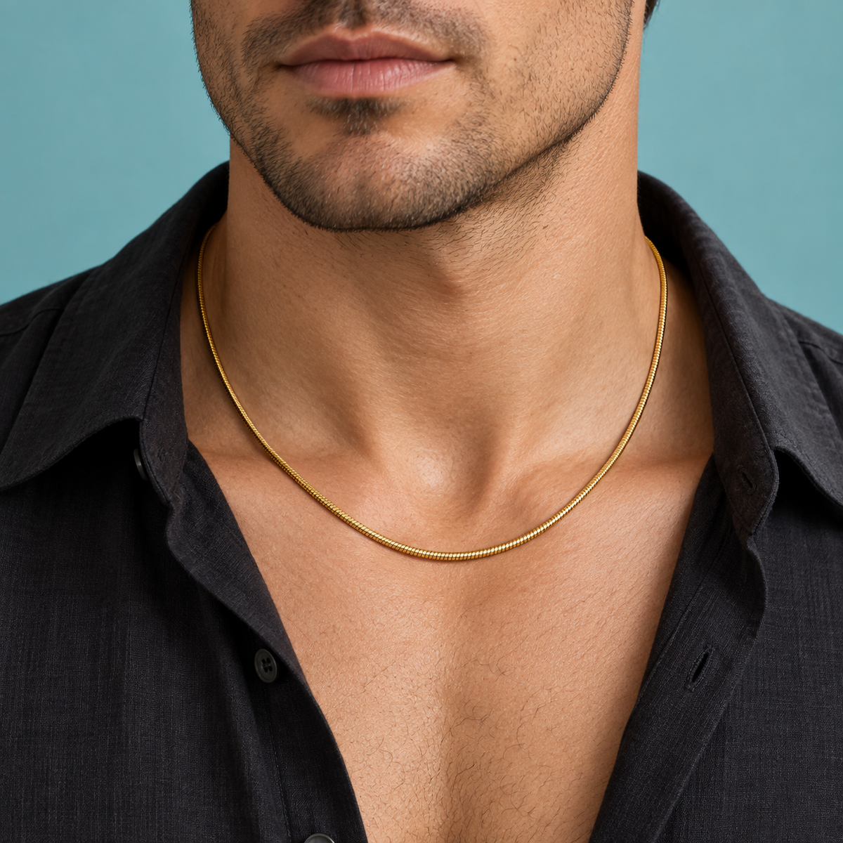 Gold-tone rounded snake-chain necklace with an extender