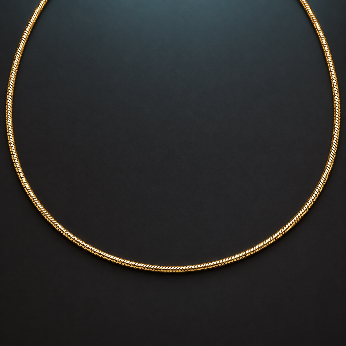 Gold-tone rounded snake-chain necklace with an extender