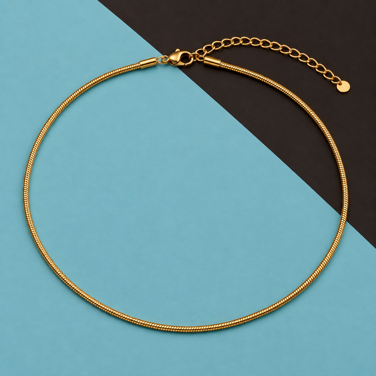 Gold-tone rounded snake-chain necklace with an extender