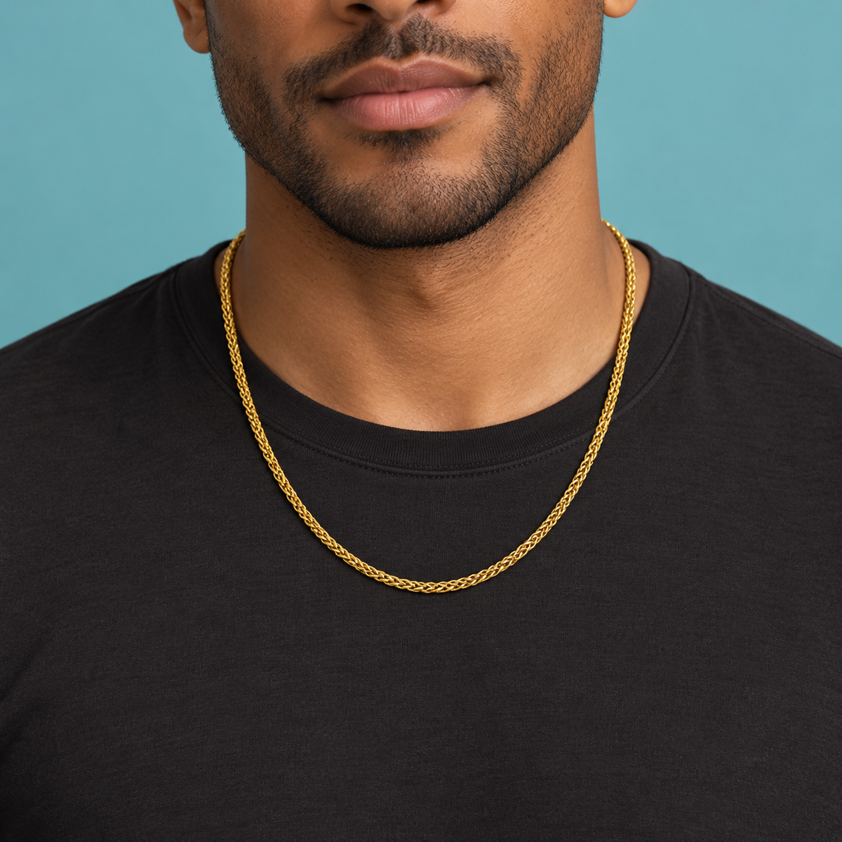 Gold-tone necklace with a woven wheat-style chain