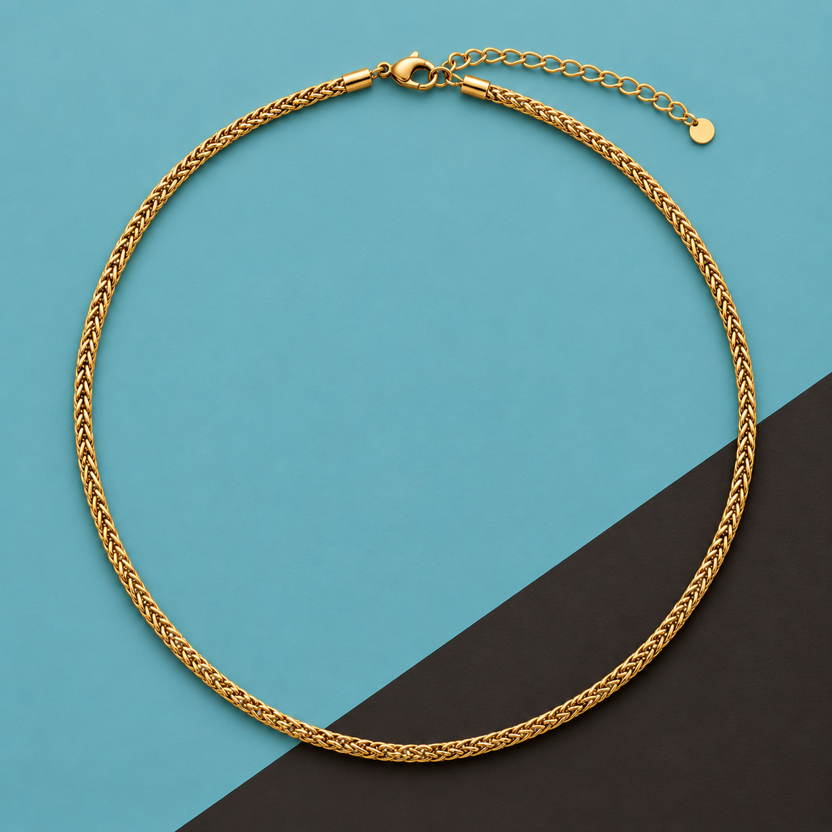 Gold-tone necklace with a woven wheat-style chain