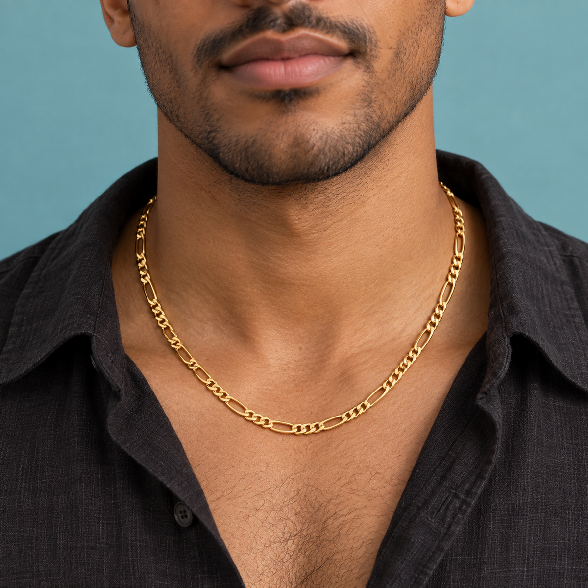 Gold-Tone Figaro Chain Necklace for Men worn with an open black shirt