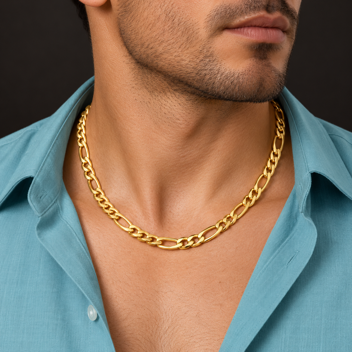 Bold Gold-Tone Figaro Necklace for Men worn with a blue shirt