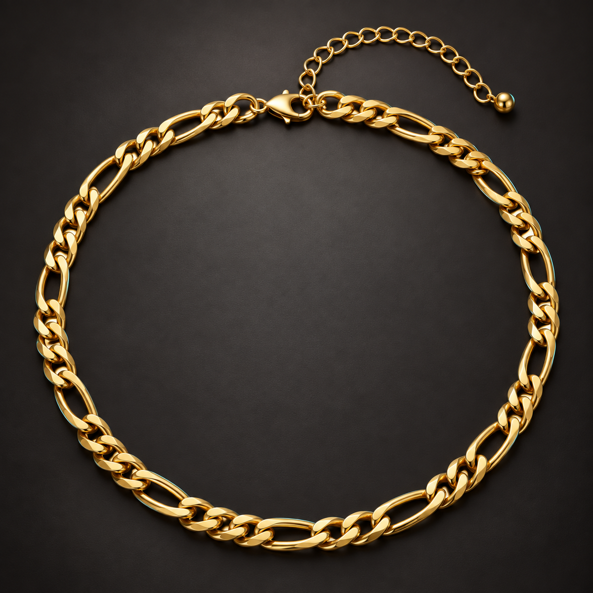 Bold Gold-Tone Figaro Necklace for Men on a dark surface