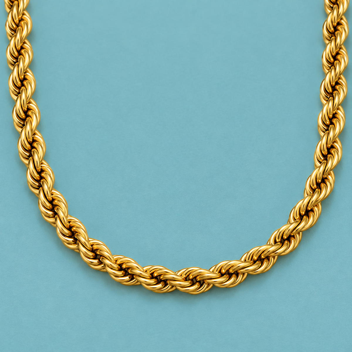 Bold Gold-Tone Rope Necklace for Men twisted-link detail on a teal background