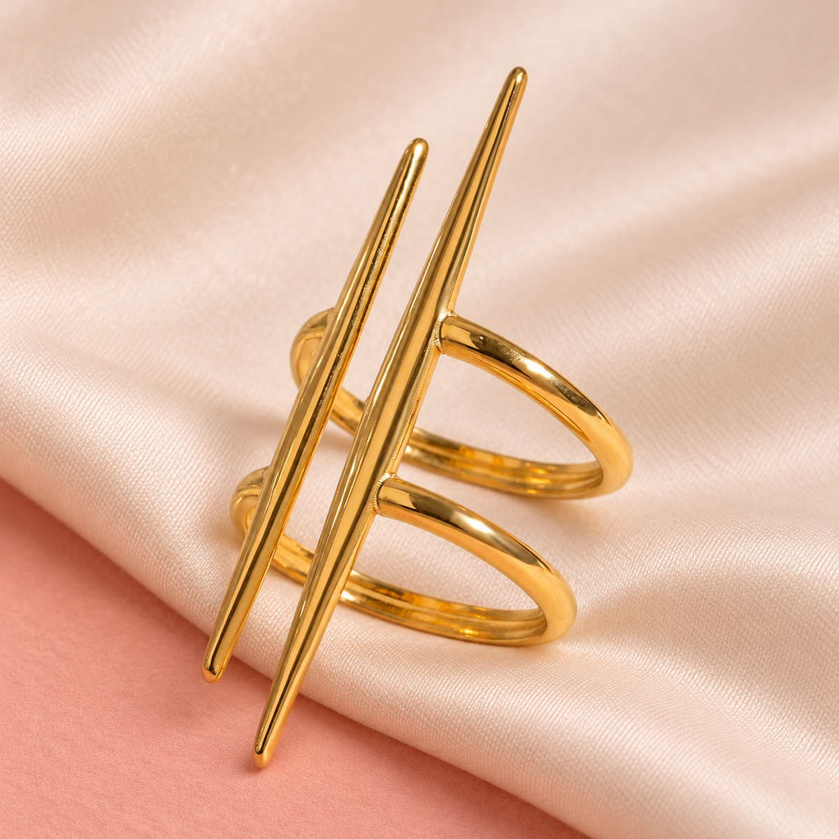 Gold-Tone Double Spike Ring on satin