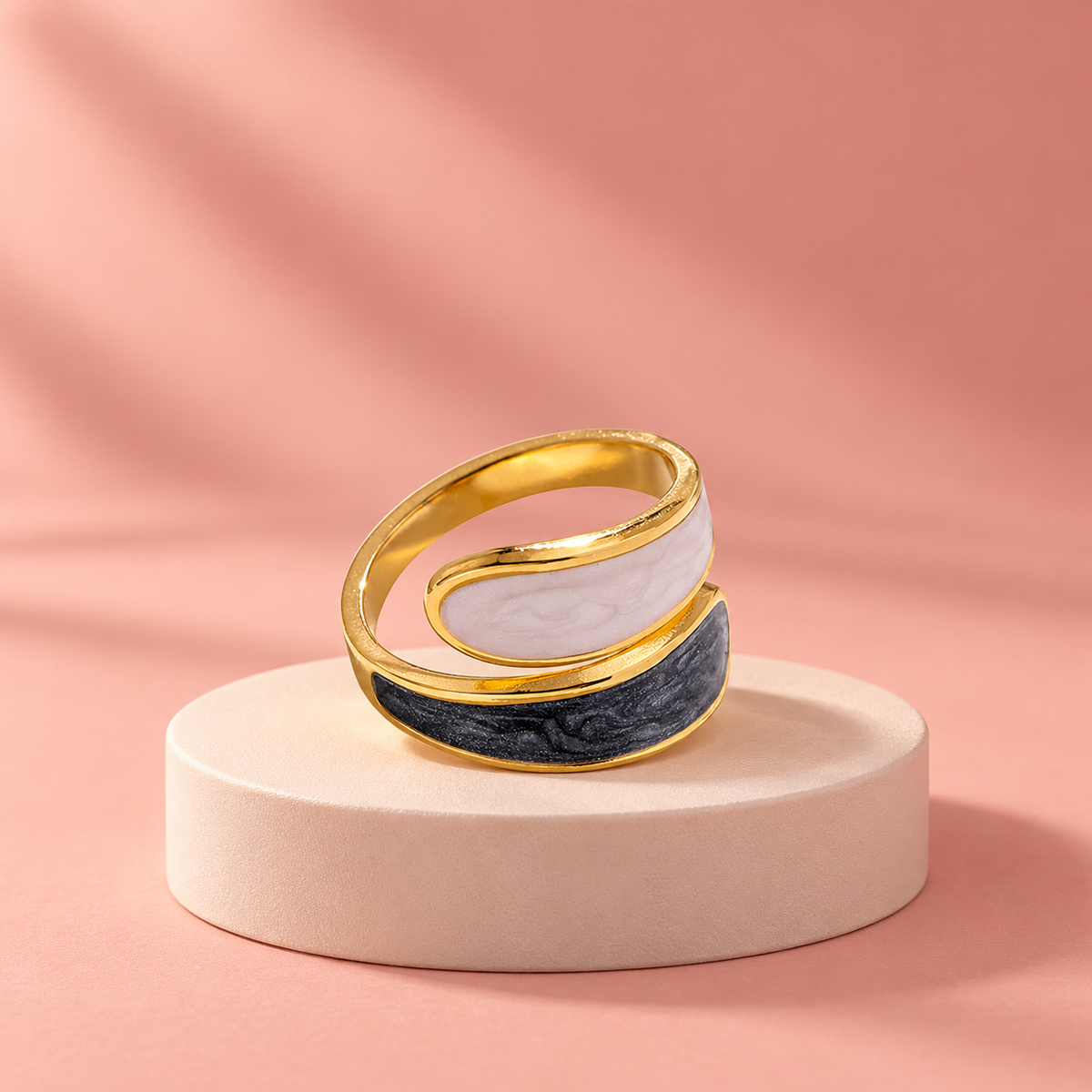 Two-tone panel ring on a pale round display plinth