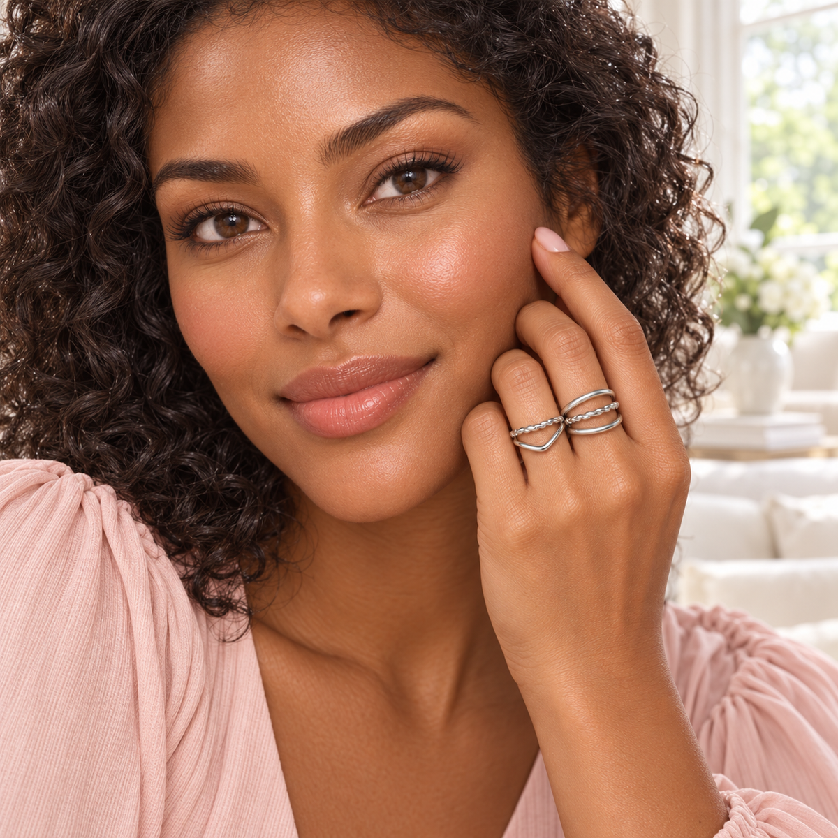 Silver-Tone Layered Ring Designs worn on a hand