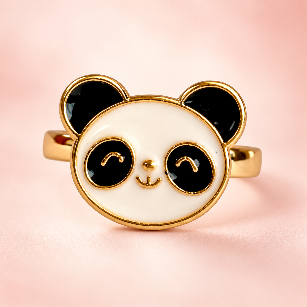 Black-and-white panda face ring with gold-tone band