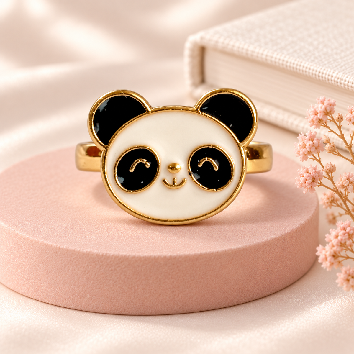 Black-and-white panda face ring with gold-tone band