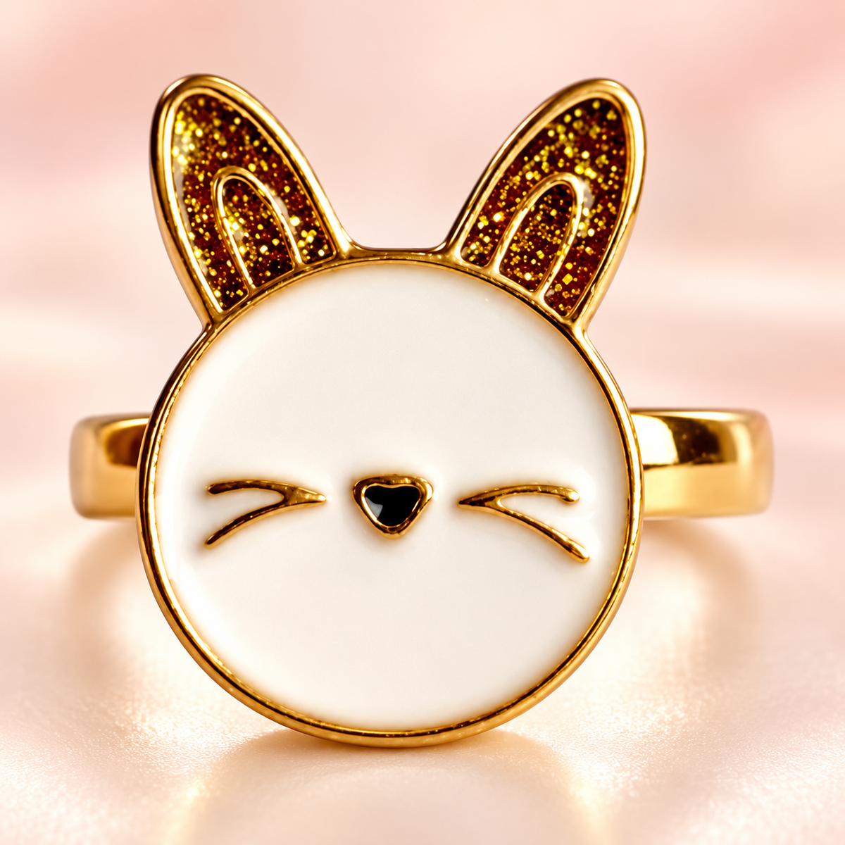 Gold-Tone Bunny Ring on a softly coloured background