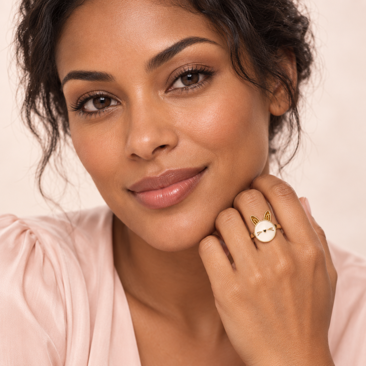 Gold-Tone Bunny Ring worn on a hand