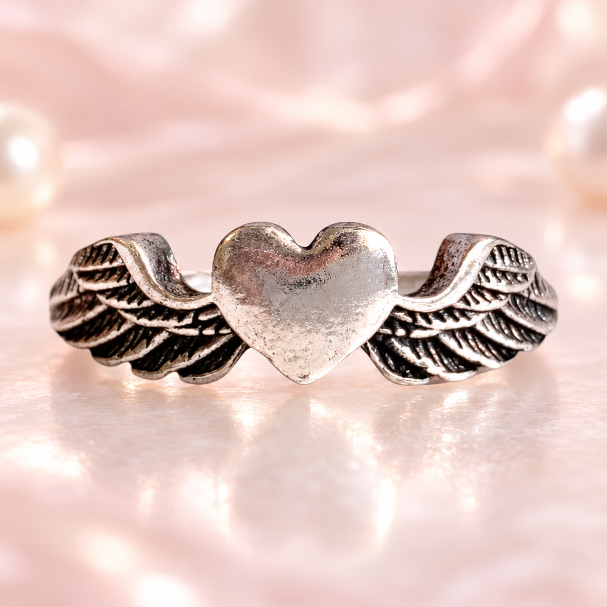 Silver-Tone Winged Heart Ring in a close product view