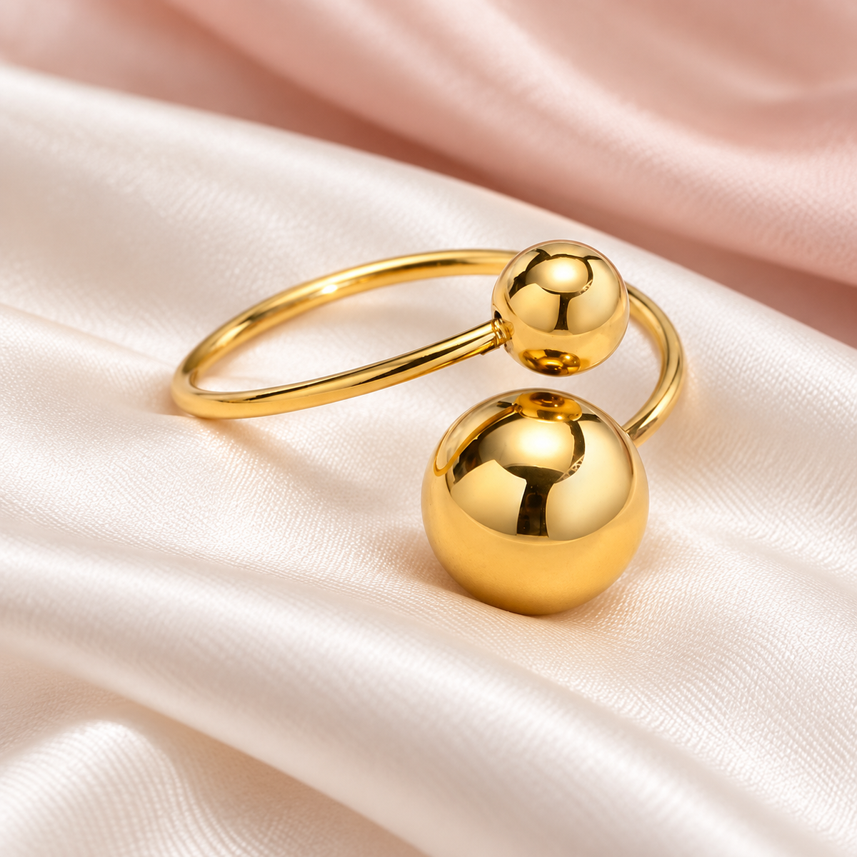 Gold-Tone Double-Sphere Open Ring for Women in a styled product photograph