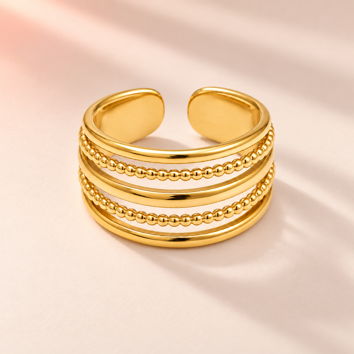 Gold-tone multi-row ring with two beaded rows