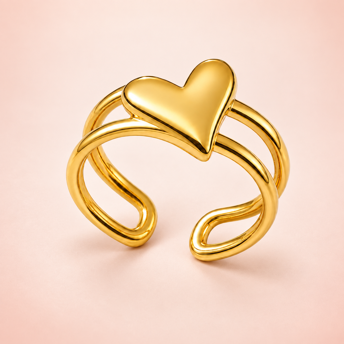 Gold-tone heart ring with an open double-rail band