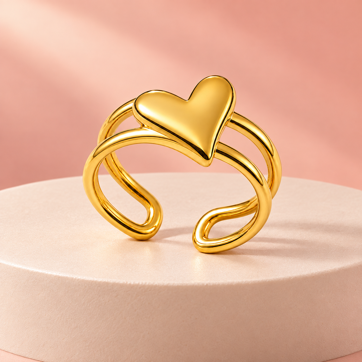 Gold-tone heart ring with an open double-rail band