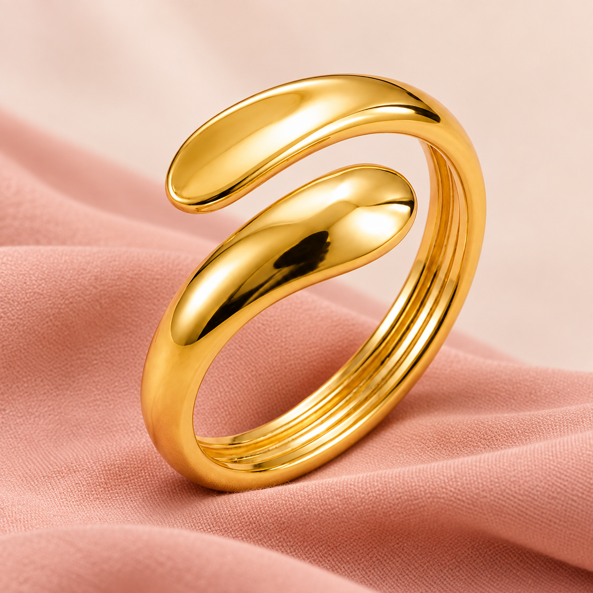 Gold-tone open bypass ring with rounded teardrop ends