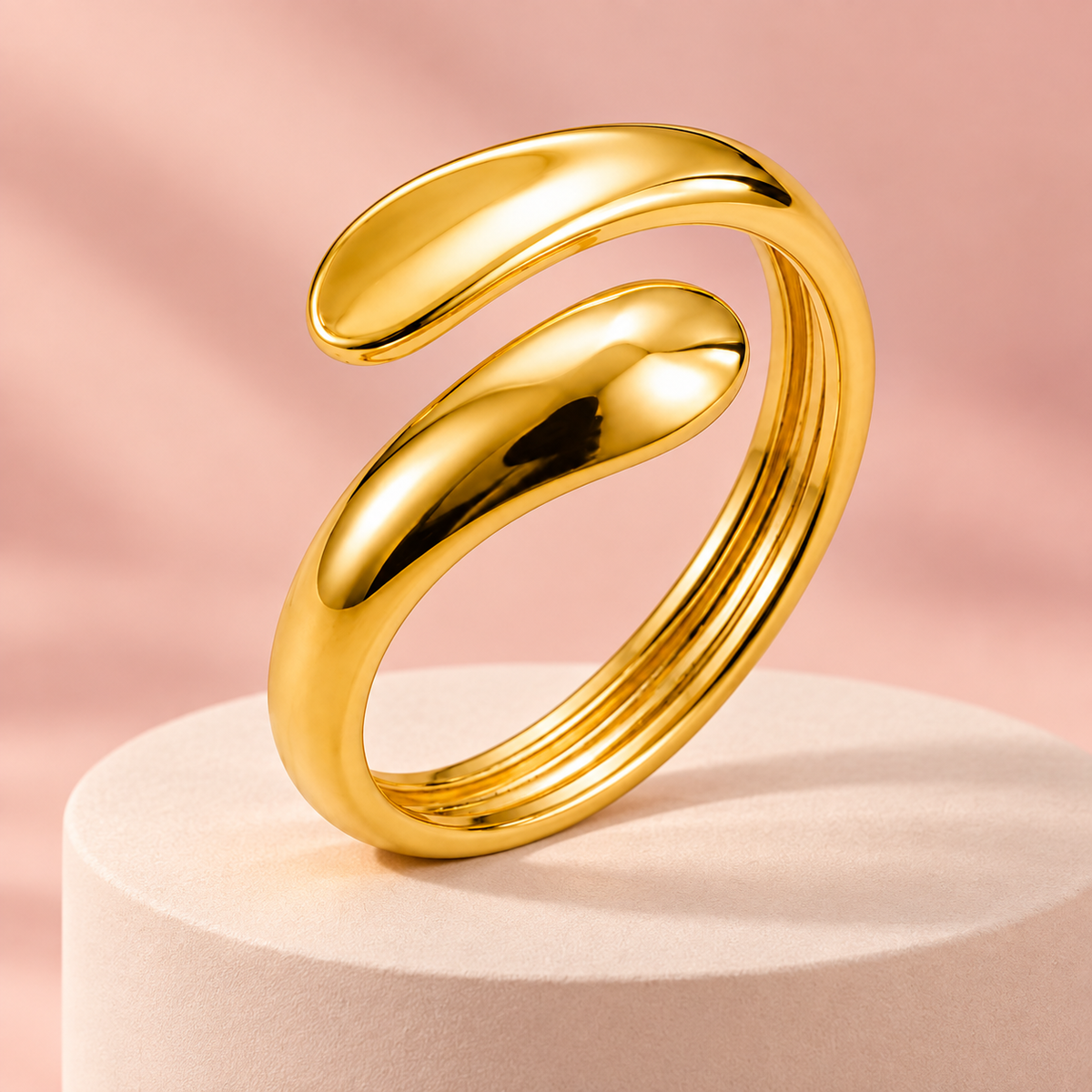 Gold-tone open bypass ring with rounded teardrop ends