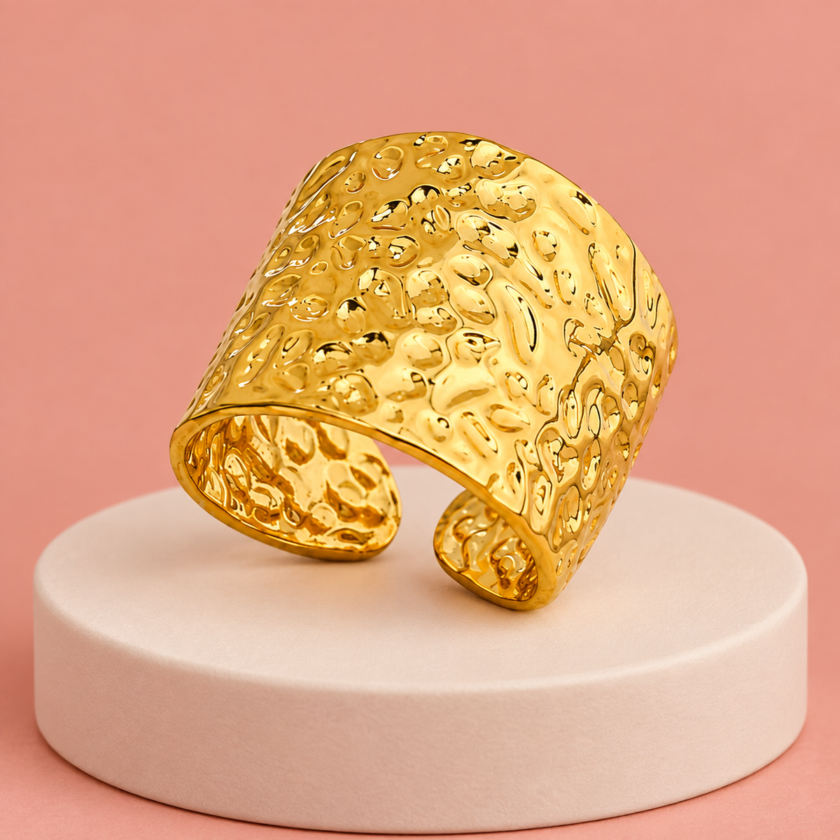 Gold-tone wide open band ring with a hammered texture