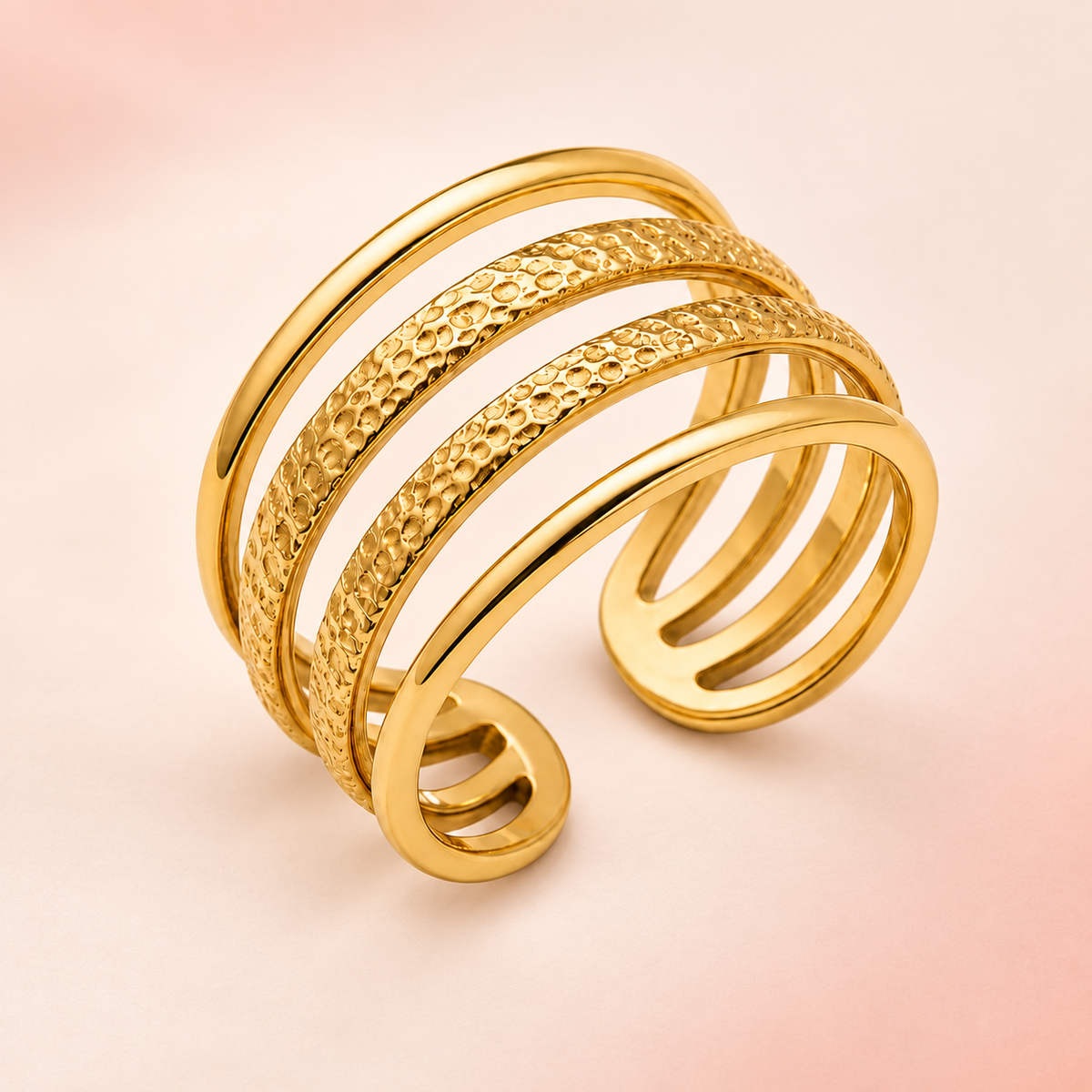 Hammered Four-Rail Ring on a softly coloured background