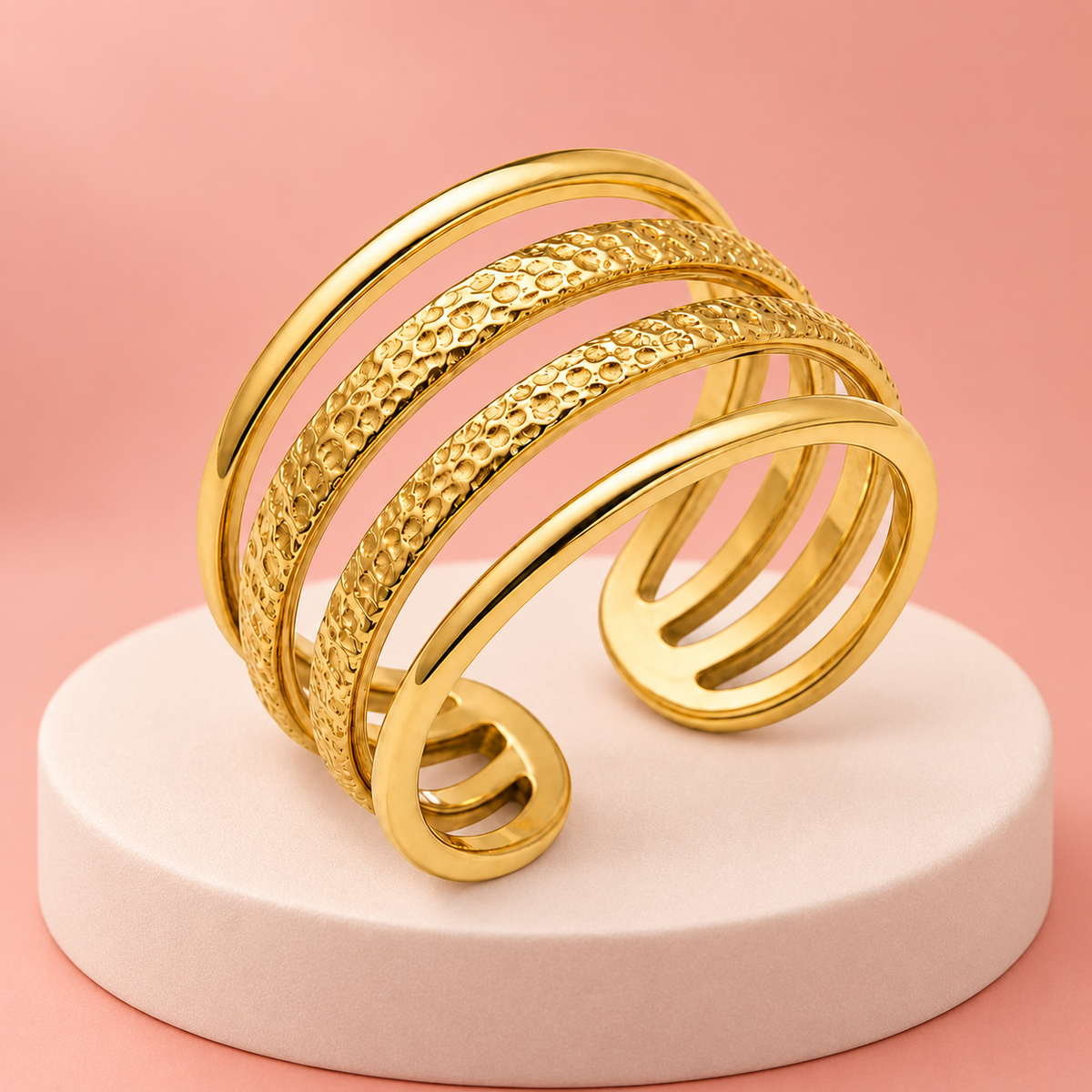 Hammered Four-Rail Ring on a display plinth