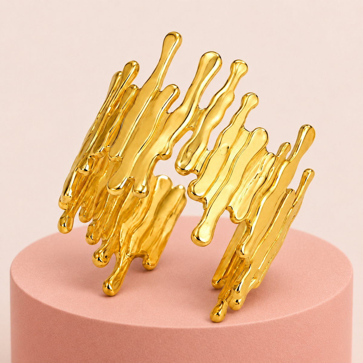 Gold-tone open ring with irregular drip-shaped edges