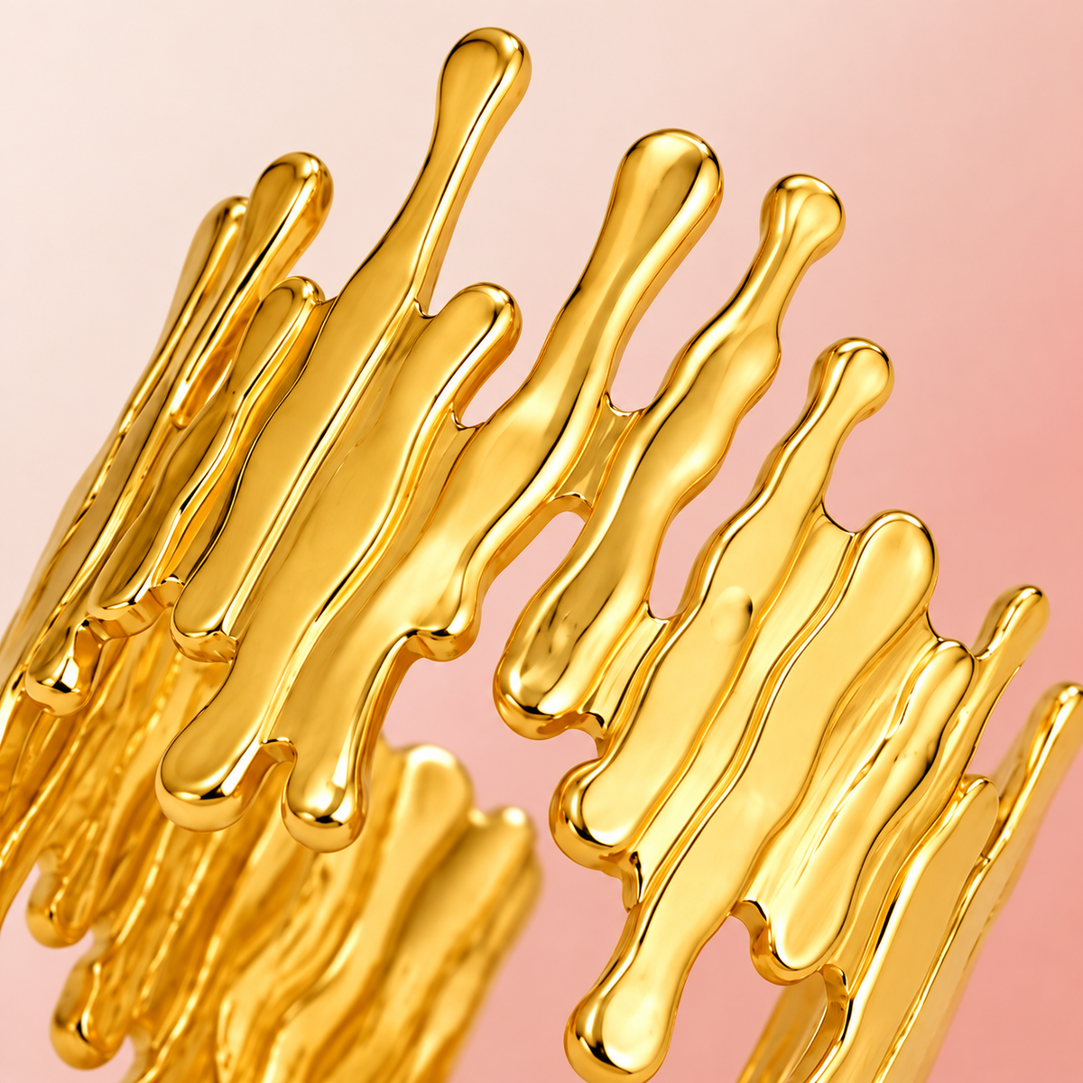 Gold-tone open ring with irregular drip-shaped edges