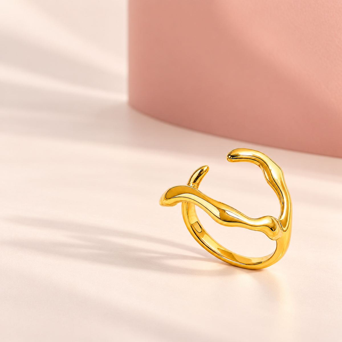 Gold-tone asymmetric open ring with wavy arms