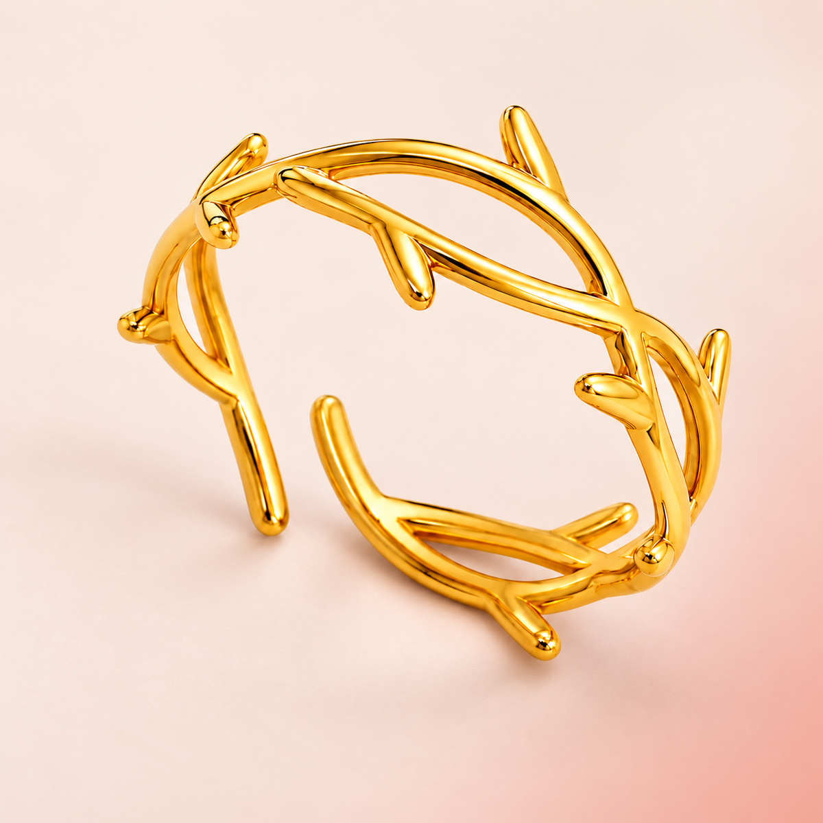 Gold-tone open ring with a twig-like design