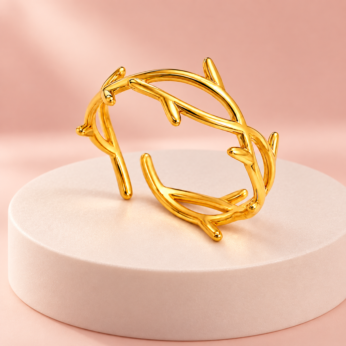 Gold-tone open ring with a twig-like design
