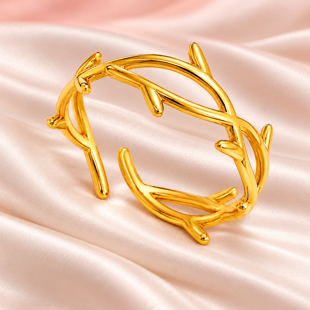 Gold-tone open ring with a twig-like design