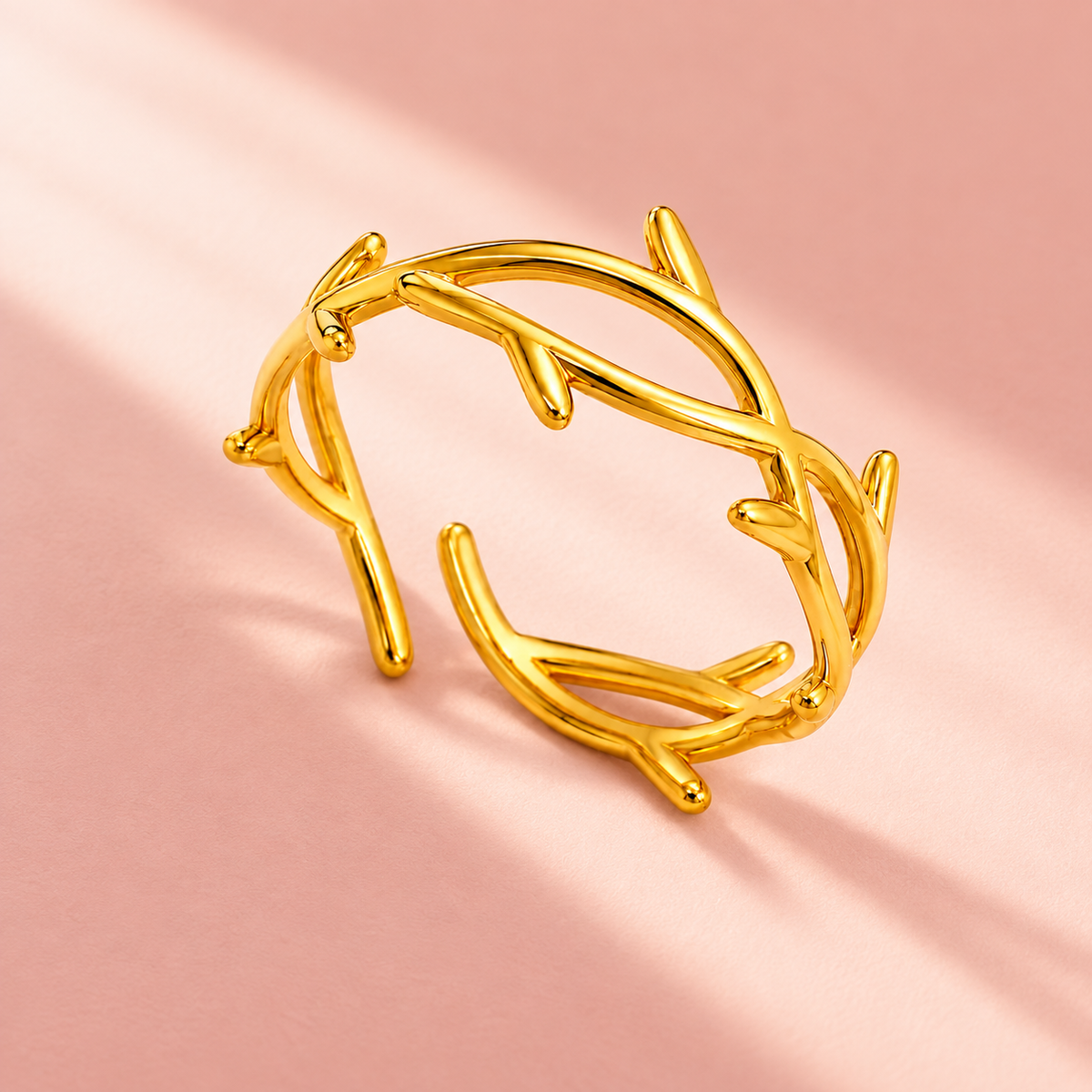 Gold-tone open ring with a twig-like design