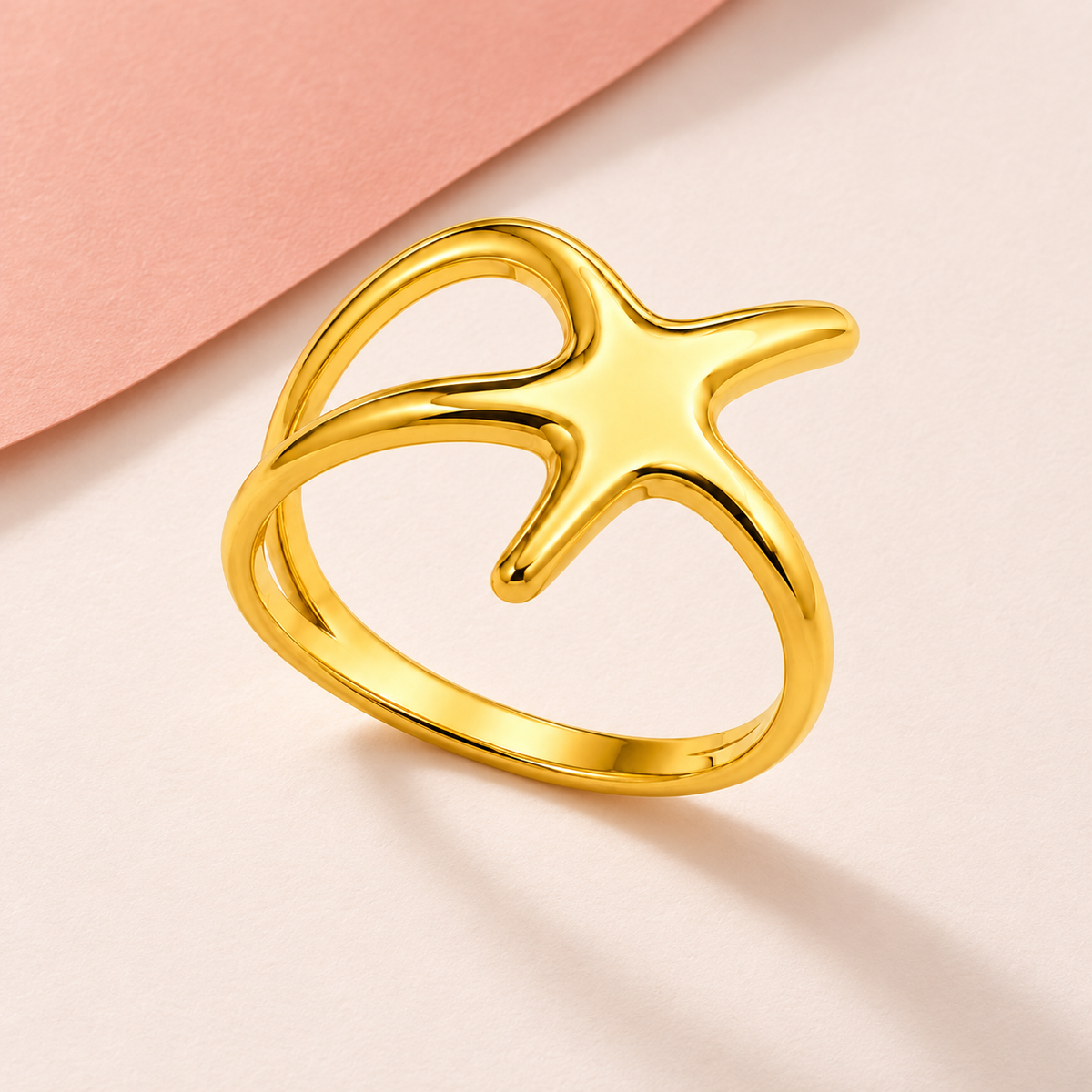 Organic Star Ring beside folded paper