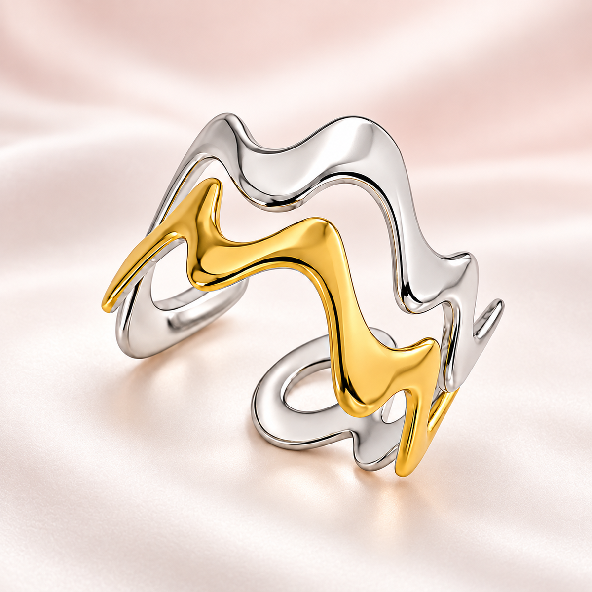 Two-tone wavy ring, product view.