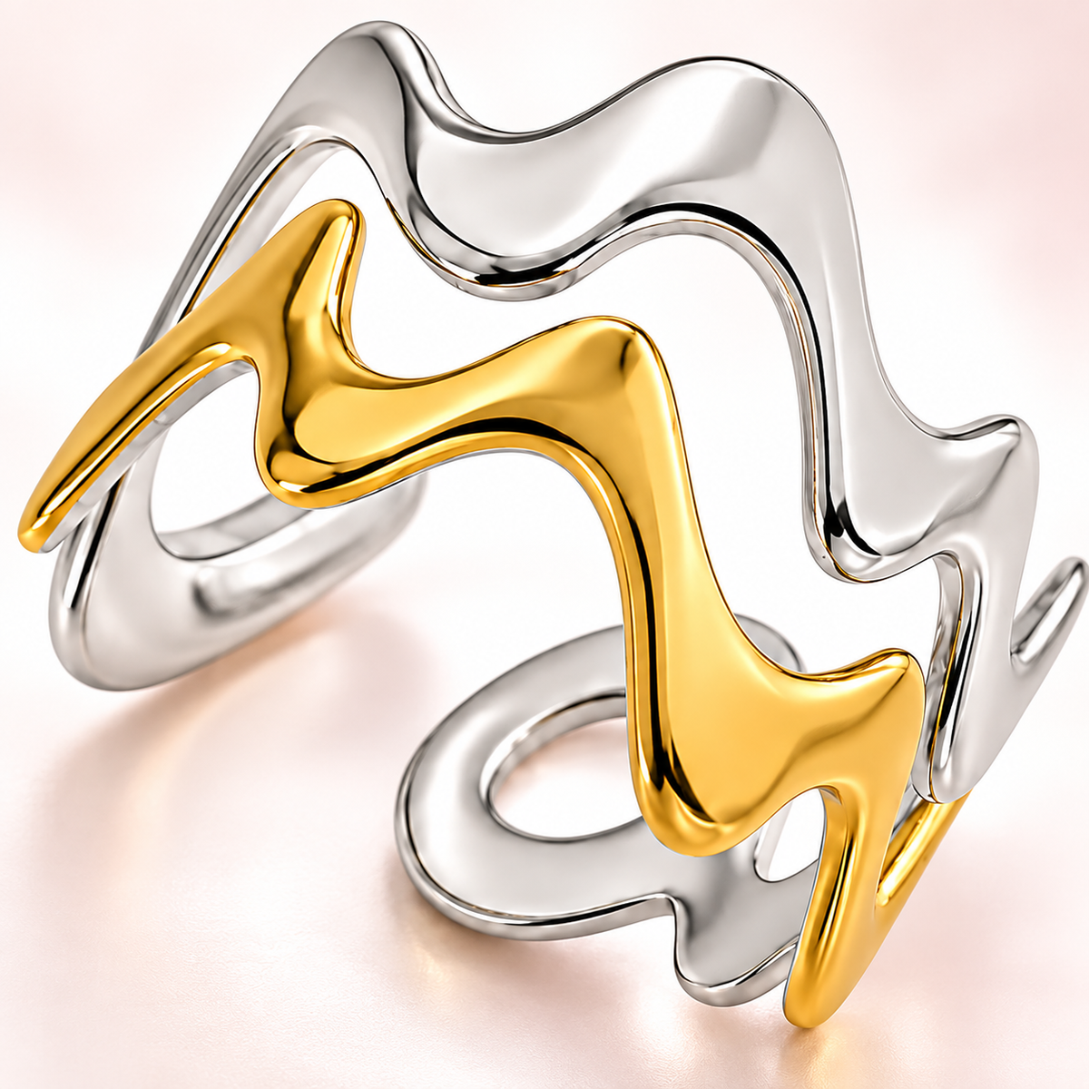 Two-tone wavy ring, close-up view.