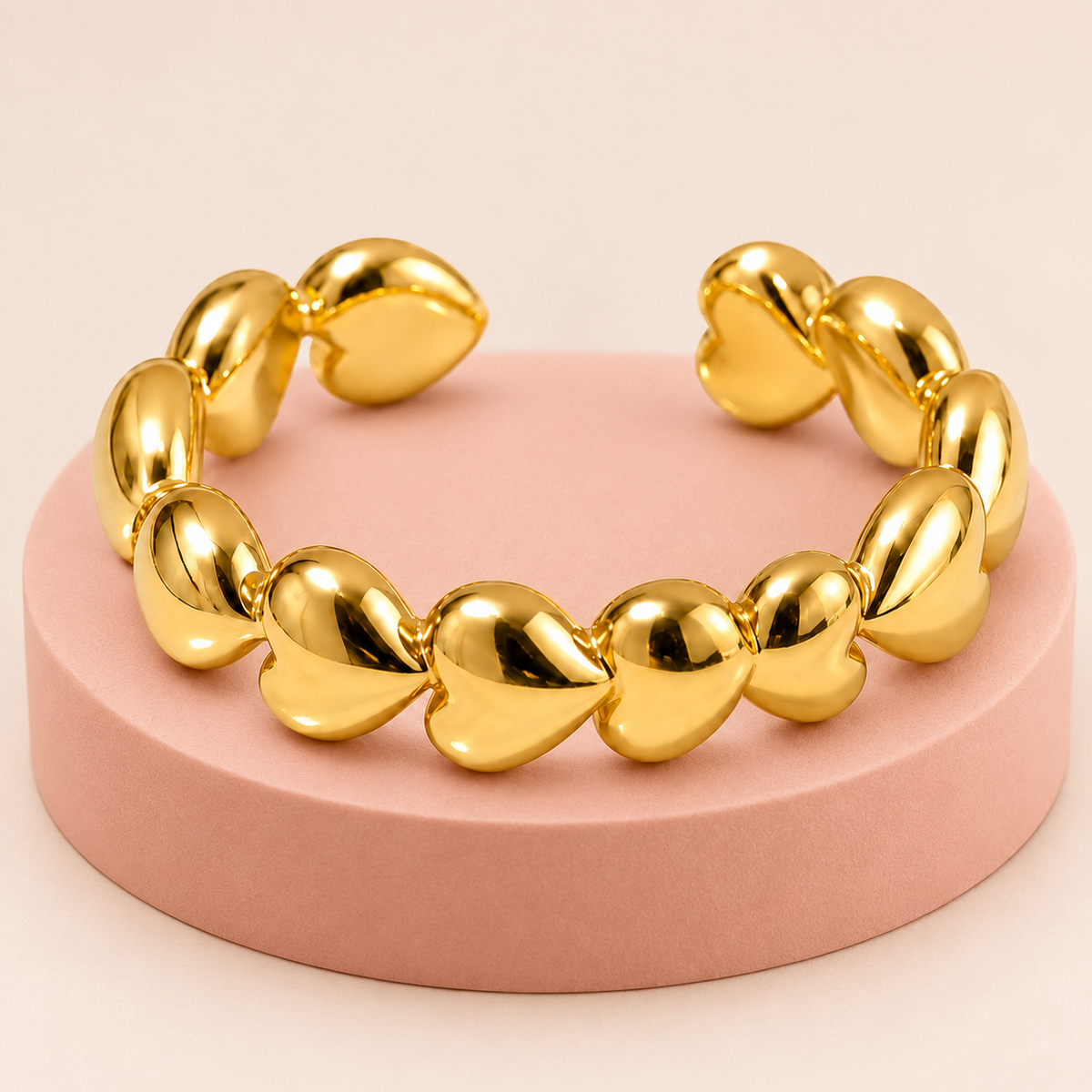 Gold-tone heart chain ring, detail view.